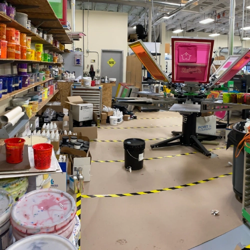 Screen printing presses in the production area